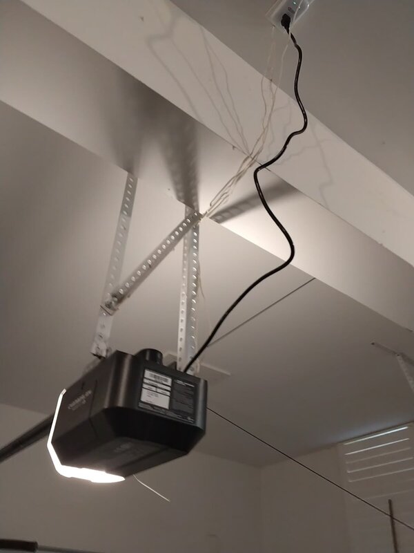 New Chamberlain belt-drive garage door opener mounted and wired, after installation, in a Ford's Colony, Williamsburg 23185 garage