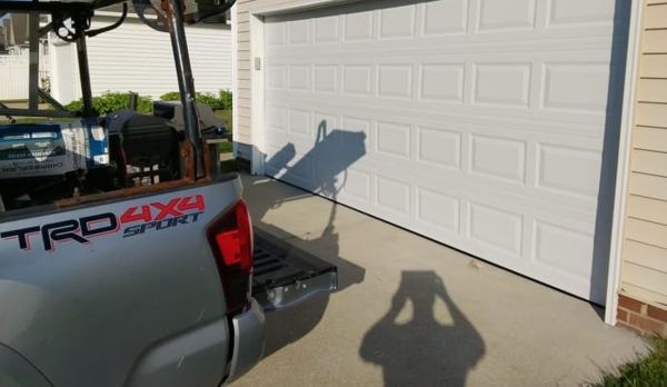 New white 16x7 raised-panel garage door installed in Wythe, Hampton, VA, July 31, 2026
