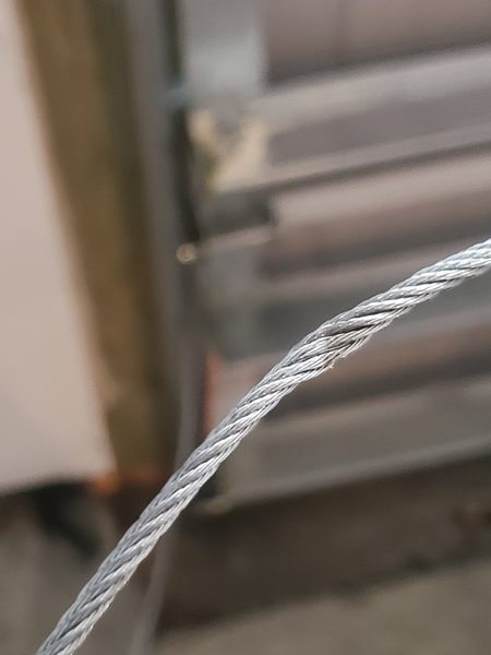 Cable drum and shaft assembly mid-replacement on a same-day cable repair in Virginia Beach