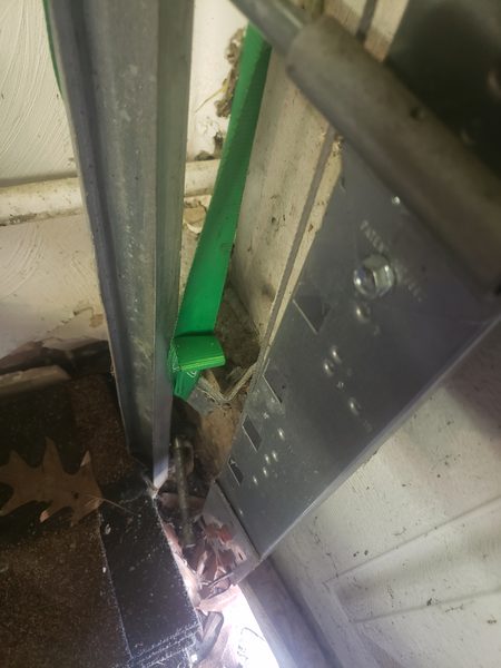 Emergency garage door off its track, an actual Seaside Garage Door job in Norfolk, VA