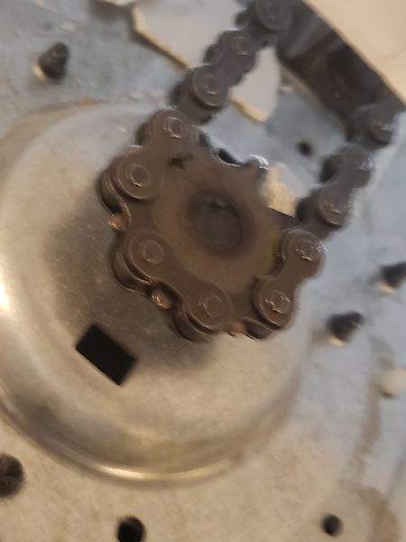Stripped opener gear during a Hampton Roads service call, the most common reason for a Genie SilentMax replacement at year 8 to 12